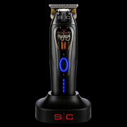 StyleCraft x 360 Jeezy Cordless Trimmer SC423B - standing on its charging stand with blue LED power ring and exposed IN3 motor window