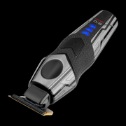 StyleCraft x 3Versince Professional Hair Trimmer at a diagonal angle on black, showing rubber grip and blue LED lights