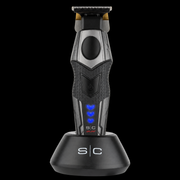 StyleCraft x 3Versince Professional Hair Trimmer upright in its S|C charging base on a black background, front view