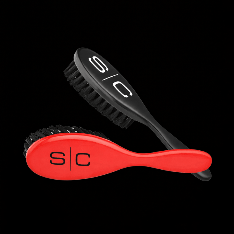 Two brushes, one red and one black, with 's/c' branding on a black background.