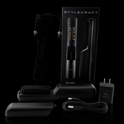Black hair styling tool set with packaging on a black background
