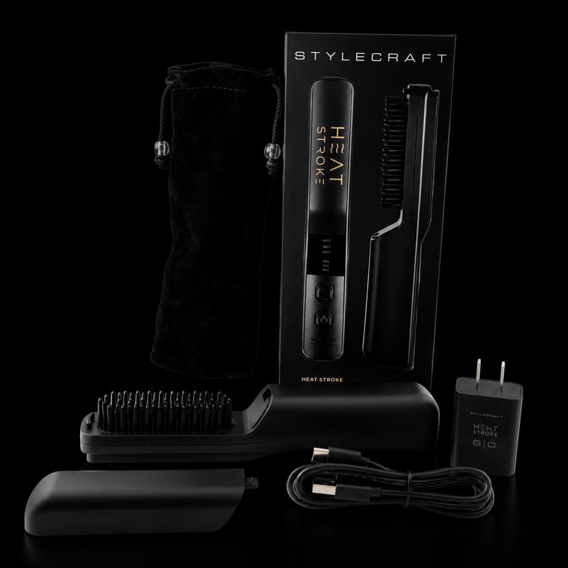 Black hair styling tool set with packaging on a black background