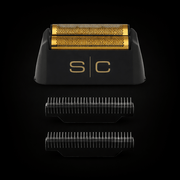 Shaving razor with gold head and black handle on a black background