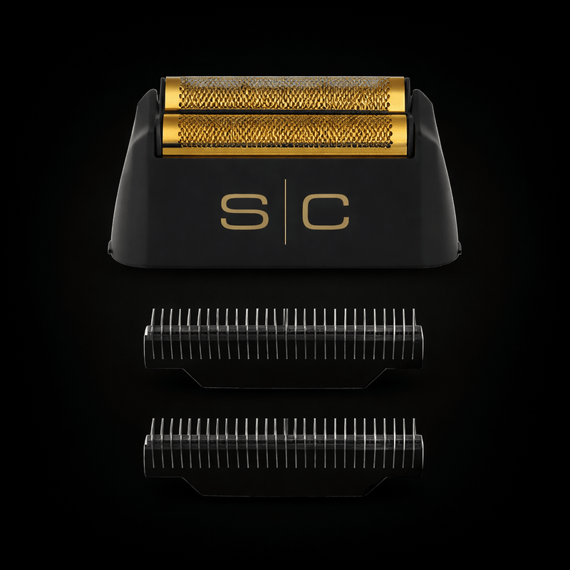 Shaving razor with gold head and black handle on a black background