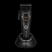 StyleCraft Instinct Metal Edition cordless hair clipper with IN2 Vector motor on charging stand