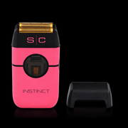 Pink and black electric shaver with 'SC' branding on a black background