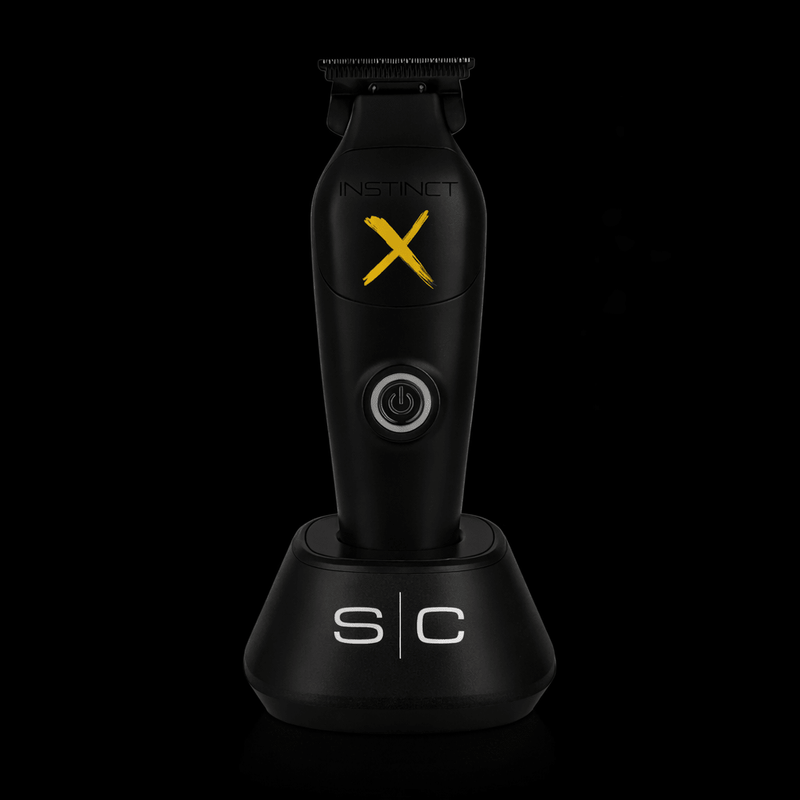 Black grooming tool with 'SC' logo on a black background