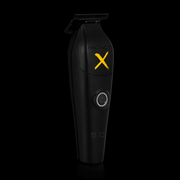 Black grooming clipper with 'Instinct X' branding on a black background