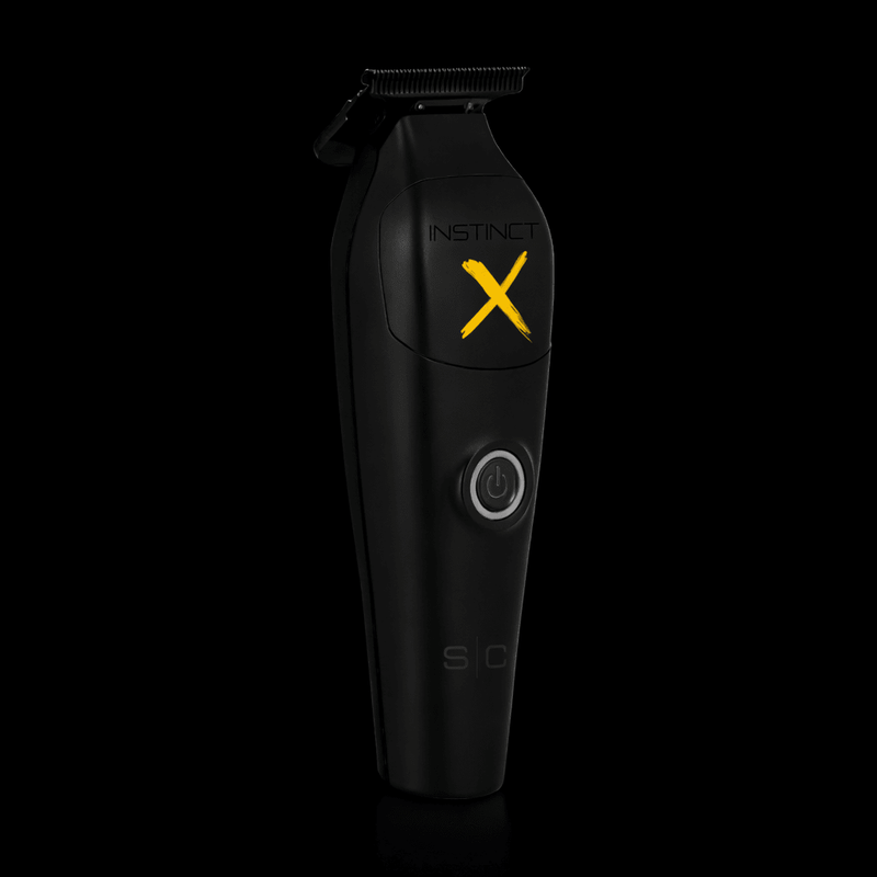 Black grooming clipper with 'Instinct X' branding on a black background