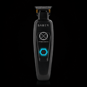 Black grooming tool with 'Saber' branding on a black background