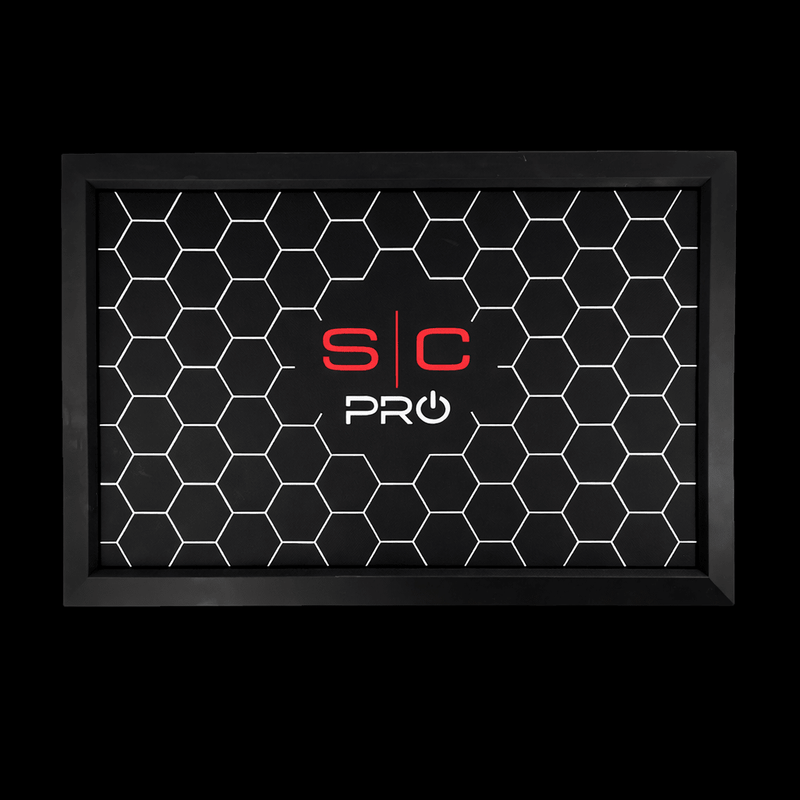Black honeycomb patterned mat with 'S/C Pro' logo on a black background. Primos Barber Supply