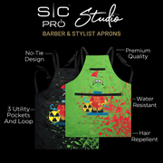 Green apron with cartoon design on a black background, featuring text about SIC Pro Studio aprons.