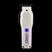 White hair clipper with purple branding on a black background