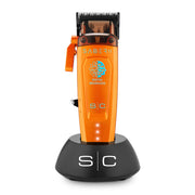 StyleCraft Saber 2.0 orange clipper standing on its black S|C charging base