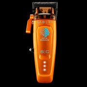 StyleCraft Saber 2.0 orange clipper front view with digital brushless badge, taper lever and LED battery lights