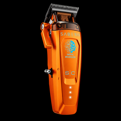 StyleCraft Saber 2.0 orange clipper angled left view showing taper lever and LED battery indicator on black background
