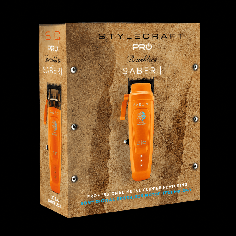 StyleCraft Pro Saber II orange cordless clipper retail box packaging featuring EON digital brushless motor technology, angled view