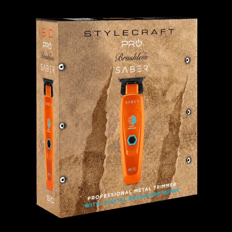StyleCraft Pro Saber II orange professional cordless trimmer retail box packaging with digital brushless motor, angled view on black background