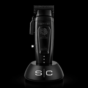 Black hair trimmer with 'Saber II' branding on a black background