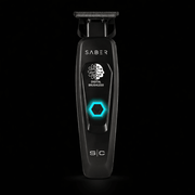 Black electric shaver with 'Saber' branding on a black background