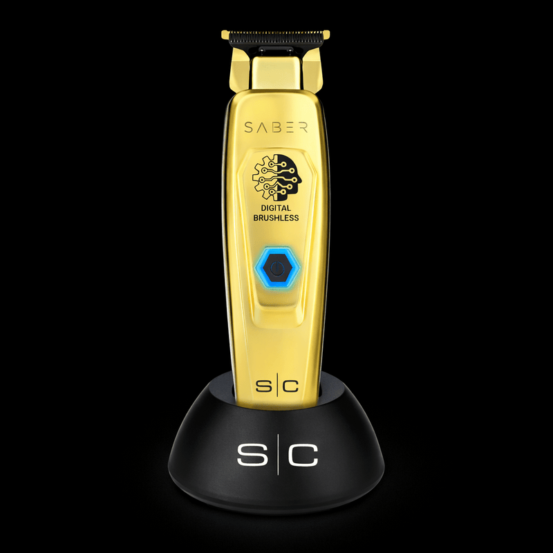 Gold electric shaver with 'Saber' branding on a black background