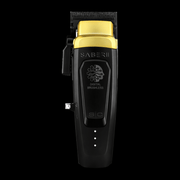 Hair trimmer with gold top and black body on a white background