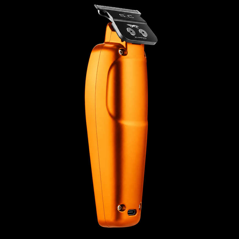 StyleCraft Saber orange trimmer angled back view of the metal body, X-Pro blade and USB-C port