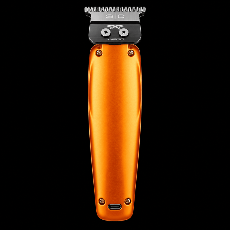 StyleCraft Saber orange trimmer back view with X-Pro blade and USB-C charging port on black background