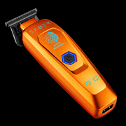 StyleCraft Saber orange trimmer lying diagonally, top view of T-blade, Saber logo and power button