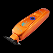 StyleCraft Saber orange professional hair trimmer SC421O angled view on black background