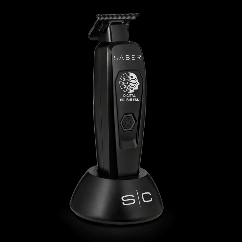 Black grooming tool with 'Saber' branding on a black background