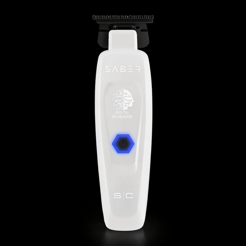 White grooming tool with 'Saber' branding on a black background