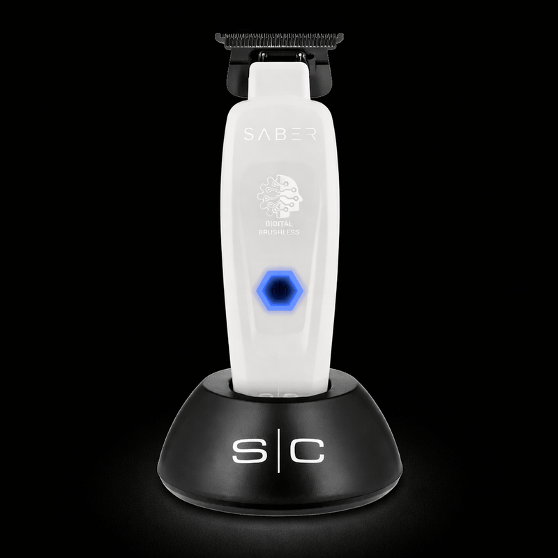 Saber grooming tool on a black stand with a dark background