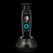 Black grooming tool with digital display on a black background