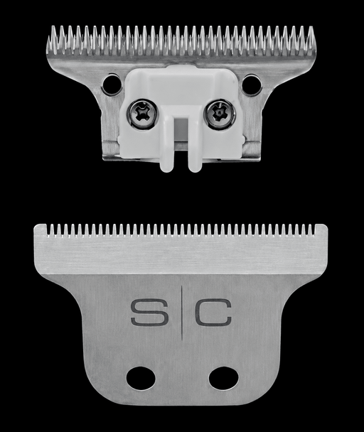 Two metal clipper blades on a black background with 'S/C' branding.