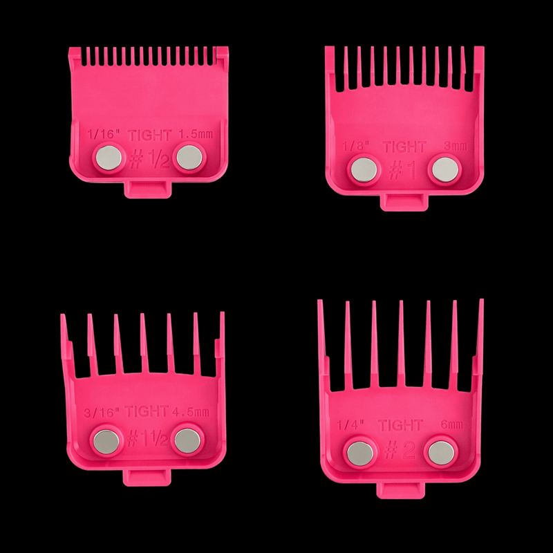 Four pink hair clipper comb attachments on a black background