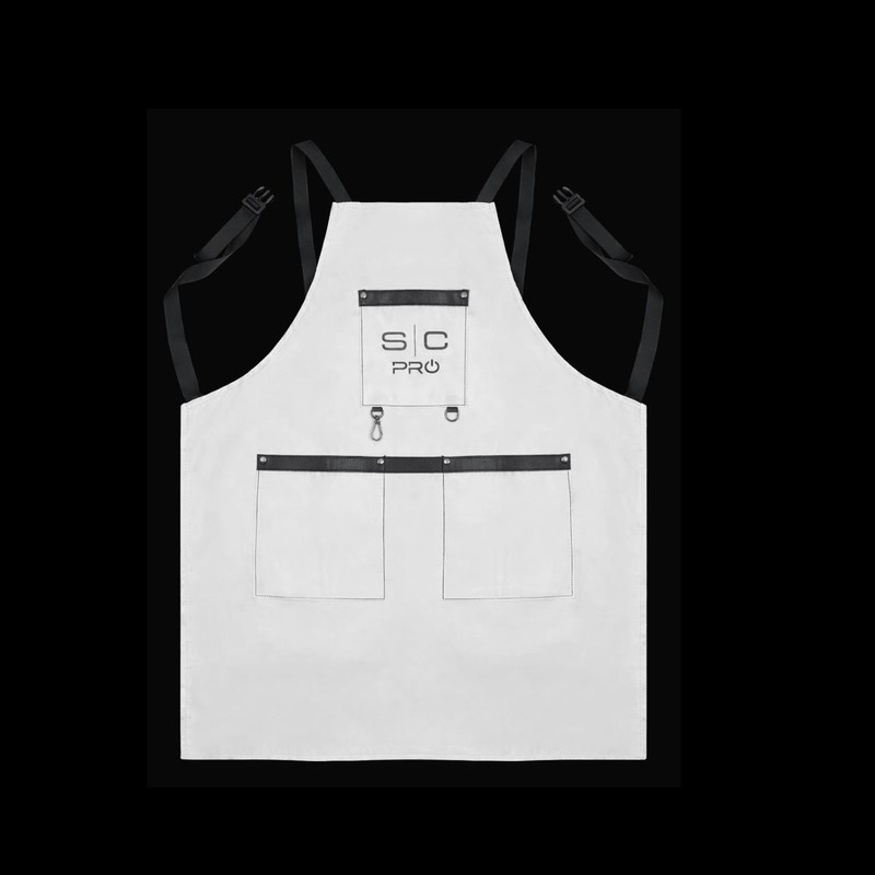 White apron with black accents on a black background