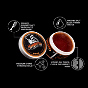 Open jars of Suavecito Paste with features listed on a black background
