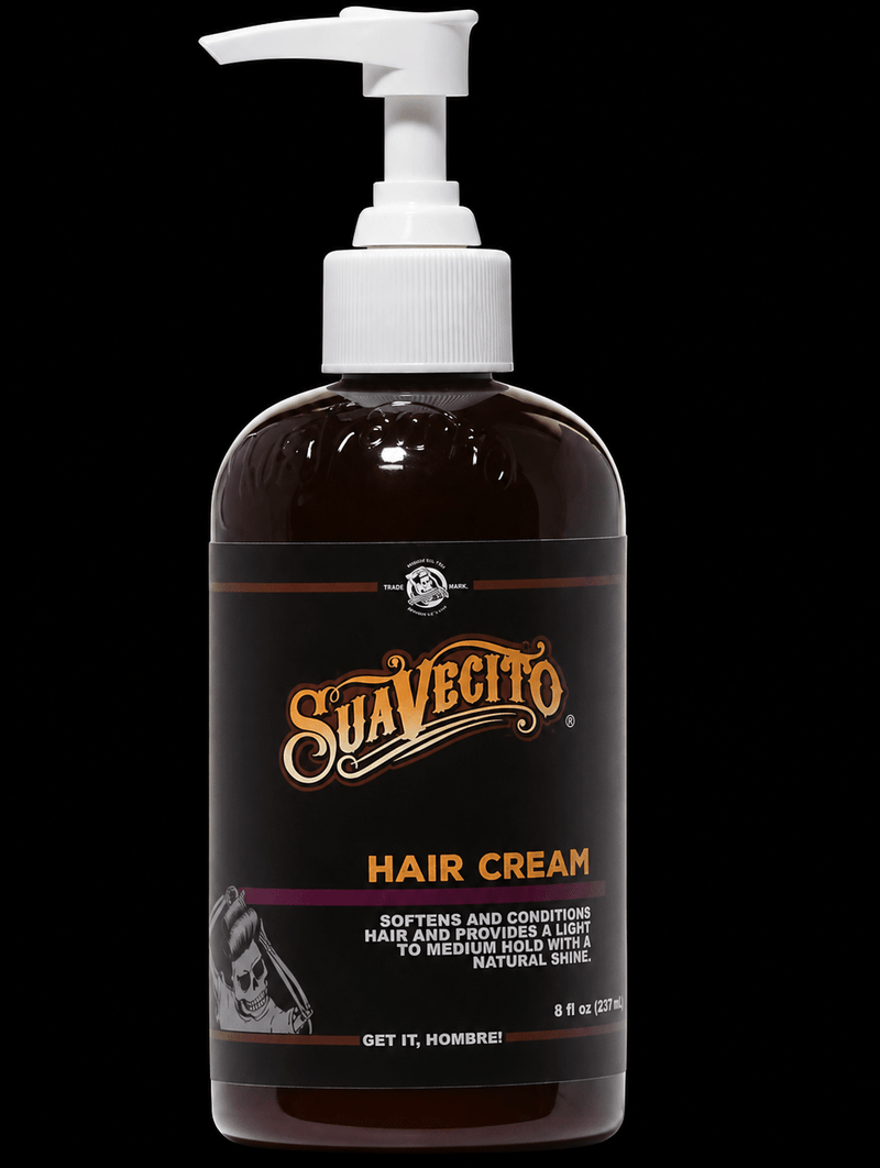 Suavecito hair cream bottle with pump on a black background