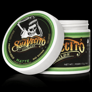 Suavecito matte pomade open jar showing texture medium hold barber styling product Primos Barber Supply