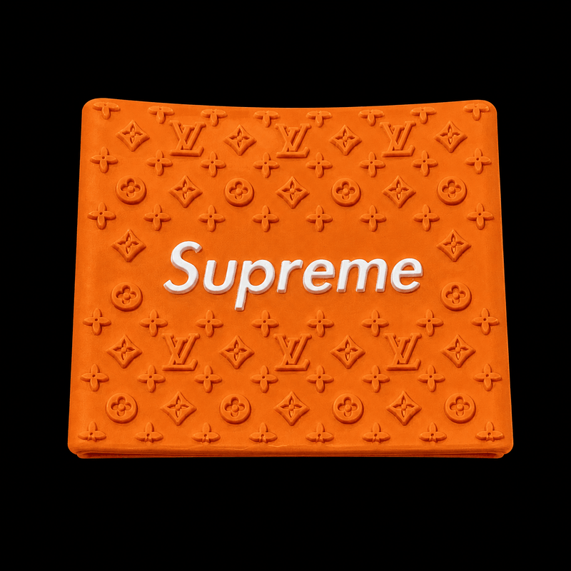 Supreme Clipper Grip in orange with white logo — silicone monogram barber clipper grip