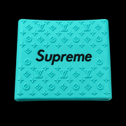 Supreme Clipper Grip in teal with black logo — silicone monogram barber clipper grip