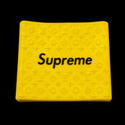 Supreme Clipper Grip in yellow with black logo — silicone monogram barber clipper grip