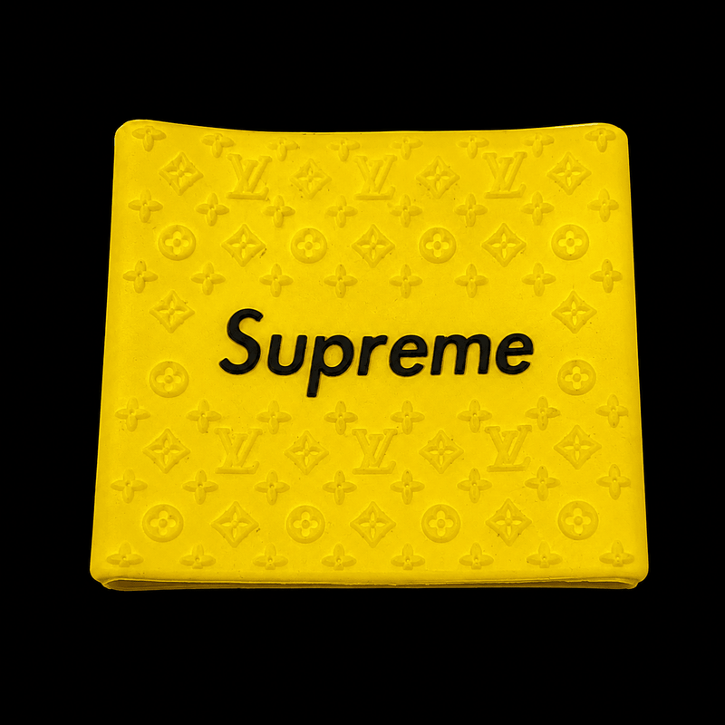 Supreme Clipper Grip in yellow with black logo — silicone monogram barber clipper grip