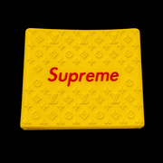 Supreme Clipper Grip in yellow with red logo — silicone monogram barber clipper grip