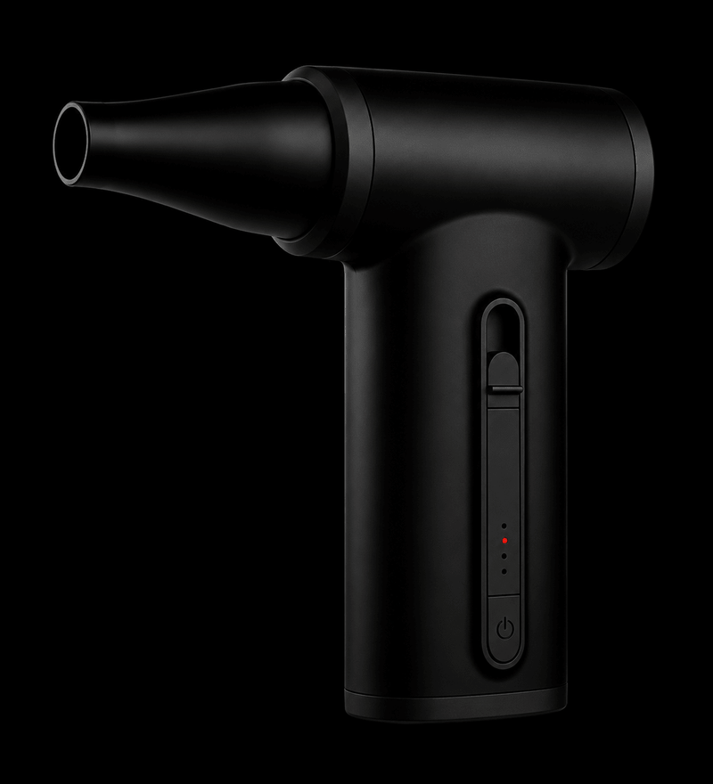 Black handheld vacuum cleaner on a black background