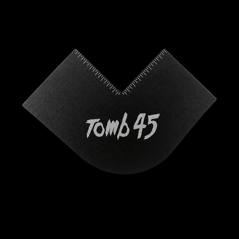 Tomb45 Black Klutch Card professional barber enhancement card for creating sharp hairlines, beard outlines, and color enhancement applications.