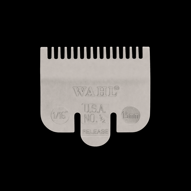 Gray Wahl hair clipper guard attachment on a black background