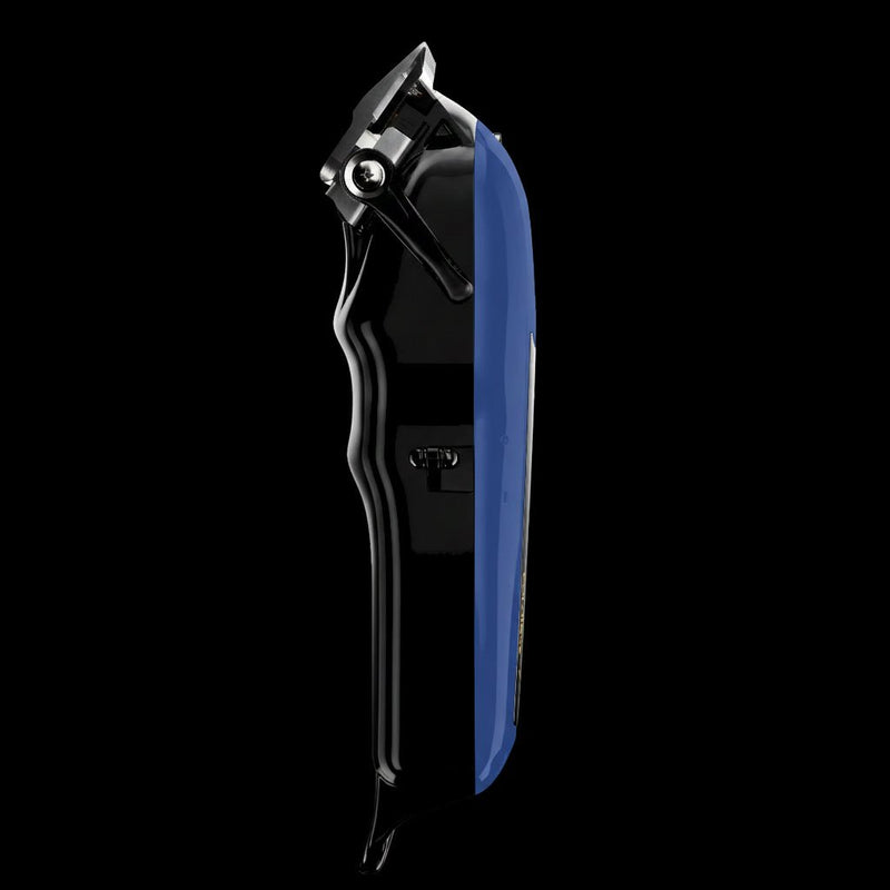 Side view of the Wahl Blue Magic Clip showing the adjustable taper lever and ergonomic thumb rest for precision fading control.