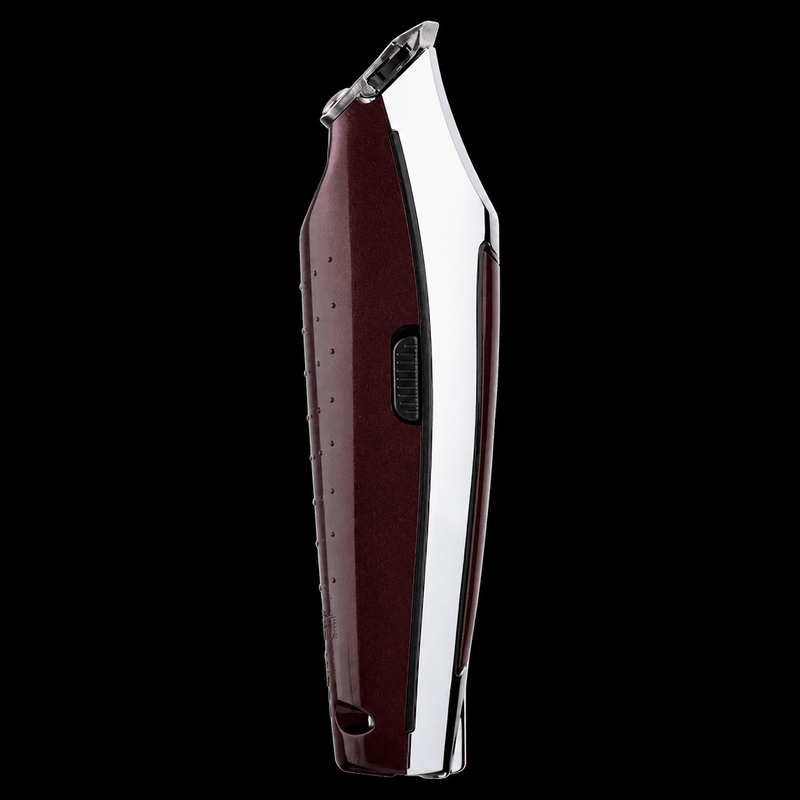 Hair clipper with a maroon and silver design on a black background